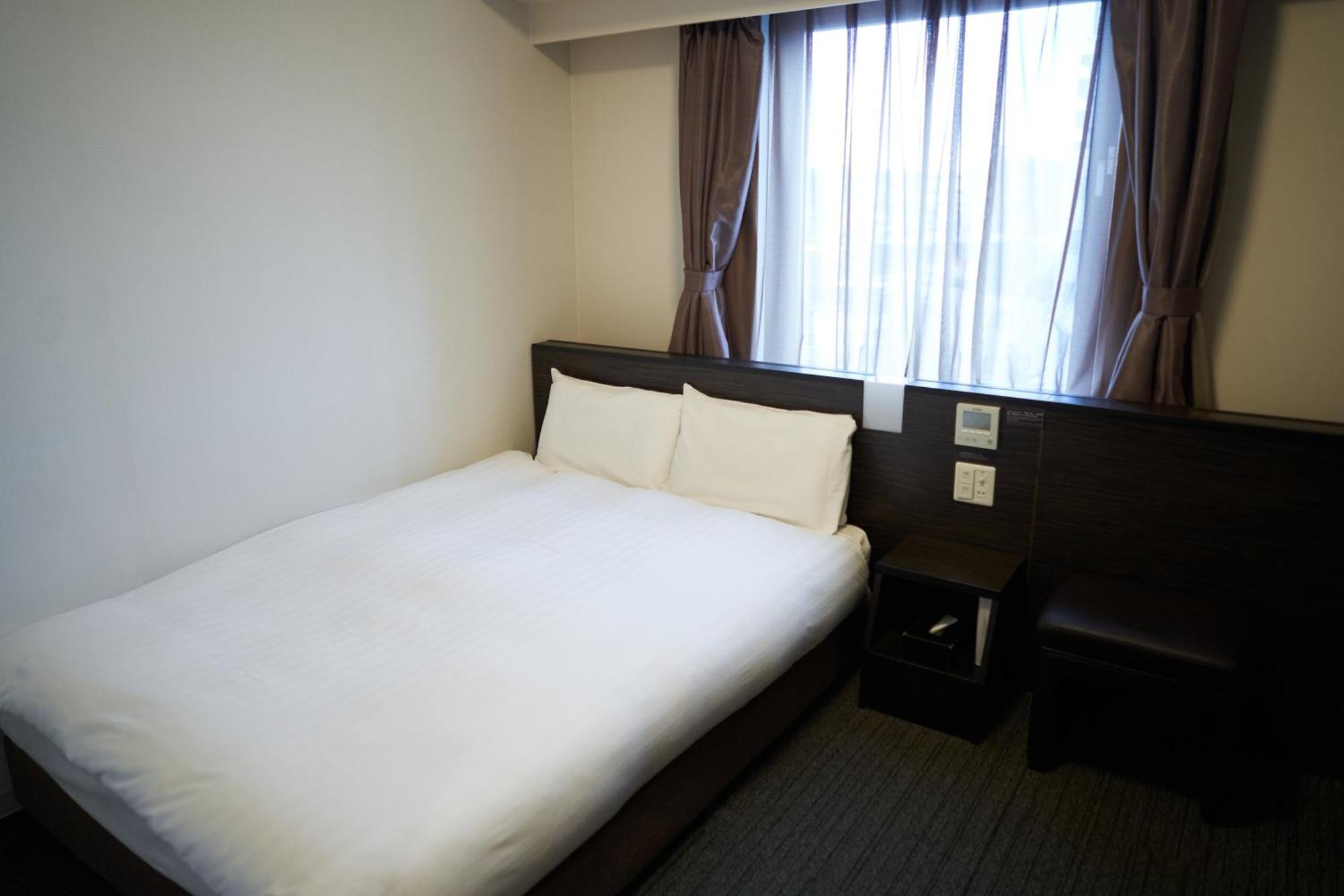 Dormy Inn Higashi Muroran Номер фото